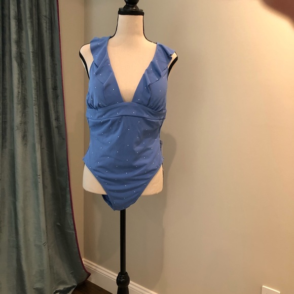 One pieces swimsuit by Robin Piccone. - Picture 3 of 8